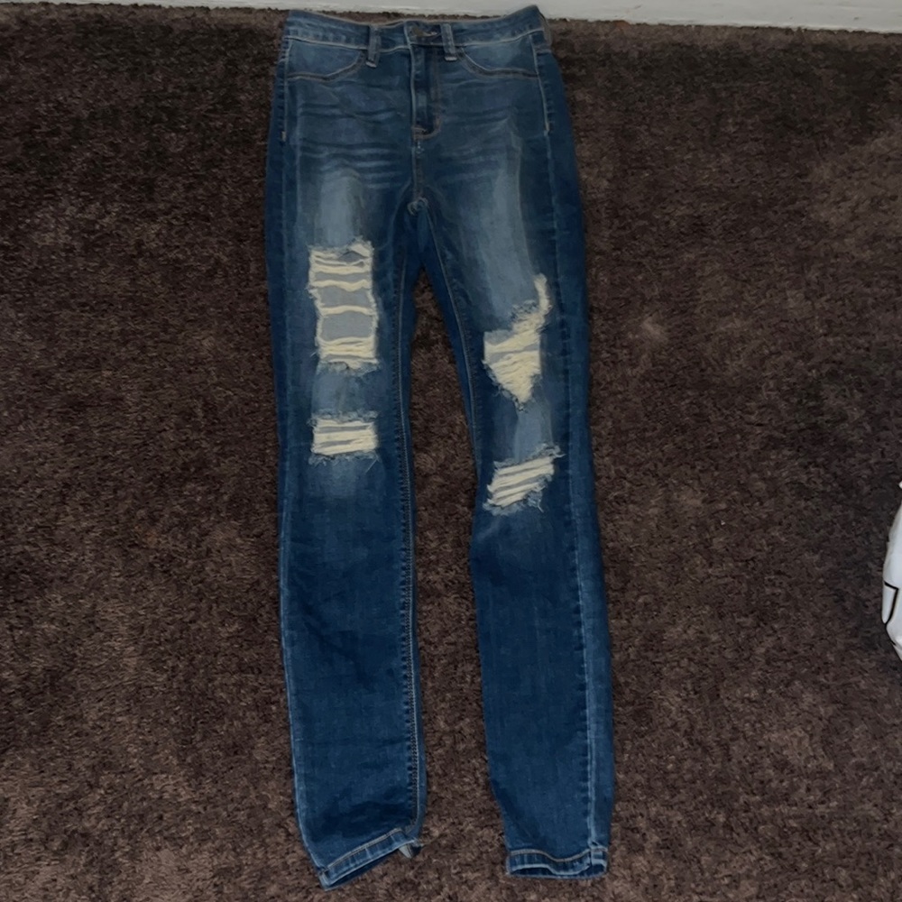 Dark blue ripped skin jeans
